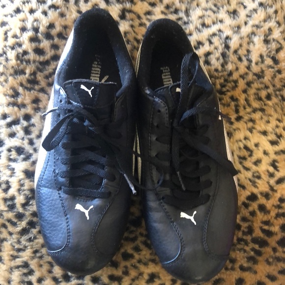 black and silver puma shoes
